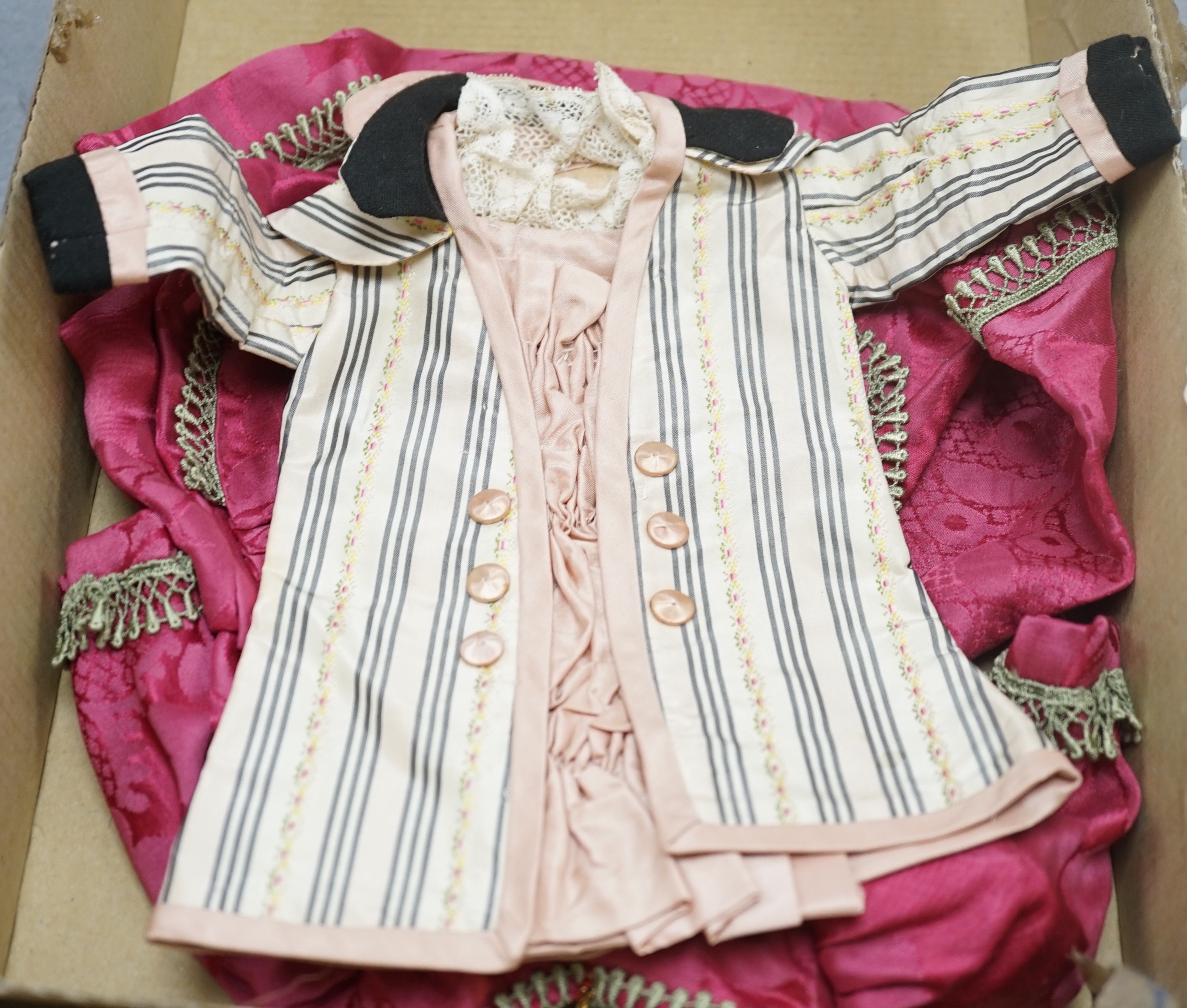 Eight dolls dresses and one hat, average 26cm